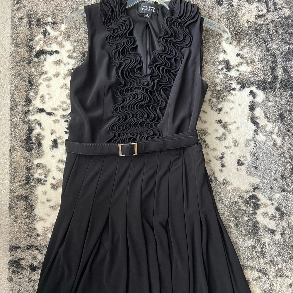 Sleeveless A-lime pleated cocktail dress.